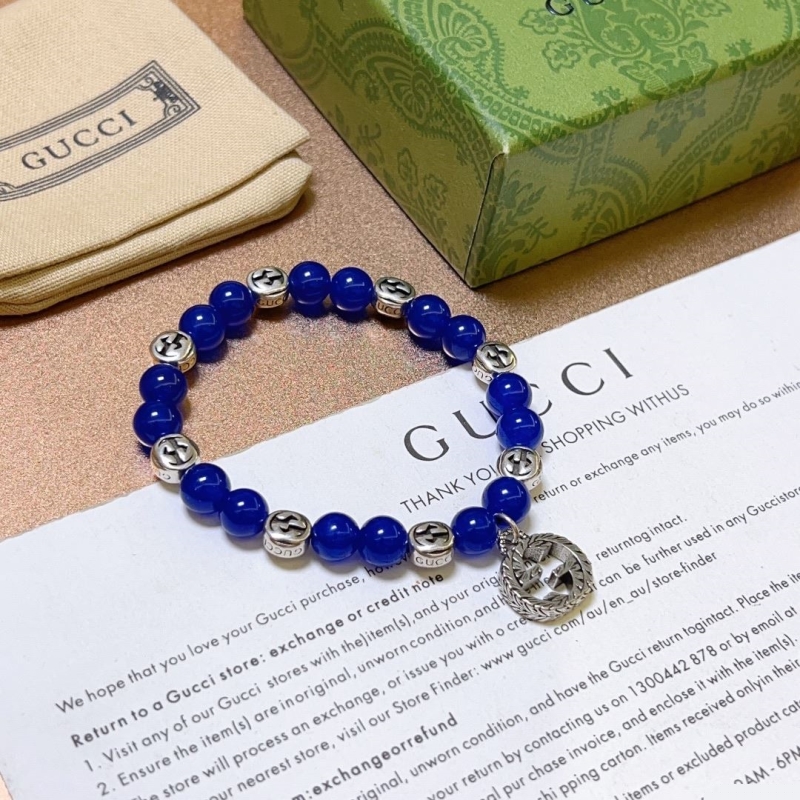 G*u*i bracelets